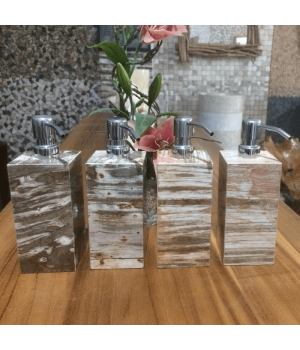 Soap dispenser made of petrified wood with polished surface